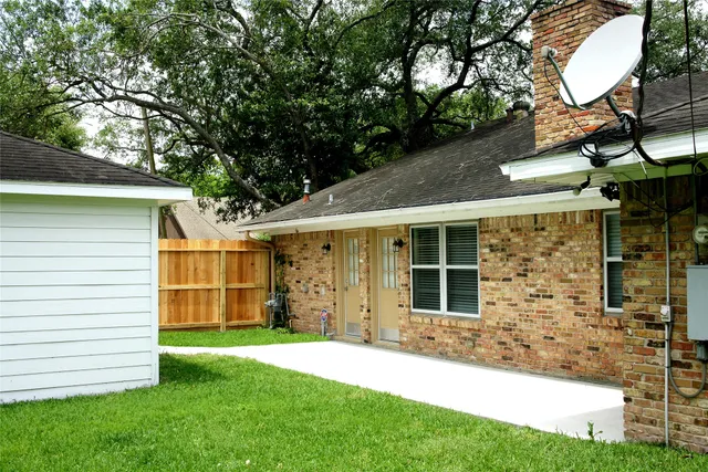 a view of a house with a garden