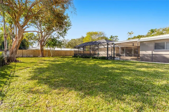 a view of a house with swimming pool