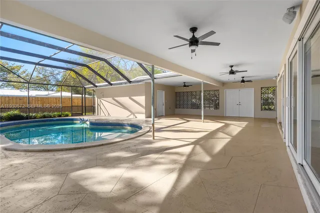 a view of a house with a swimming pool