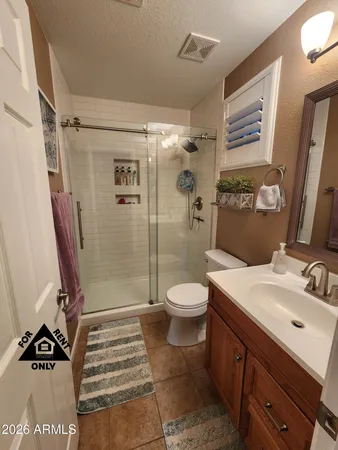 a kitchen with stainless steel appliances a stove a sink and a microwave