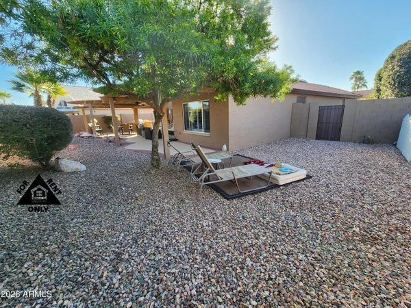 a living room with patio furniture