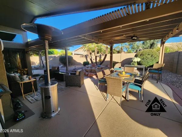 a view of kitchen with furniture and a fireplace