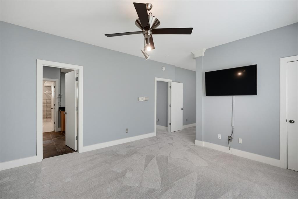 4830 Cedar Springs Road, Unit 30 Dallas, TX 75219 - Photo 20 of 32 Light-colored carpeting with a contemporary ceiling fan and recessed lighting