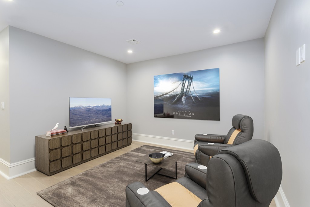 47 Chestnut Street, Unit 1 Boston, MA 02129 - Photo 11 of 17 a living room with furniture and a flat screen tv