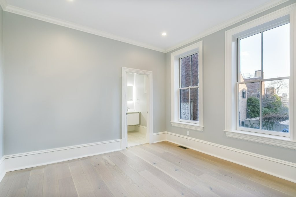 47 Chestnut Street, Unit 1 Boston, MA 02129 - Photo 15 of 17 an empty room with wooden floor and windows