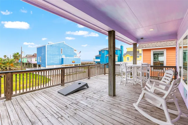 a view of a balcony with chairs