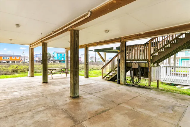 a view of an entryway with a floor to ceiling window