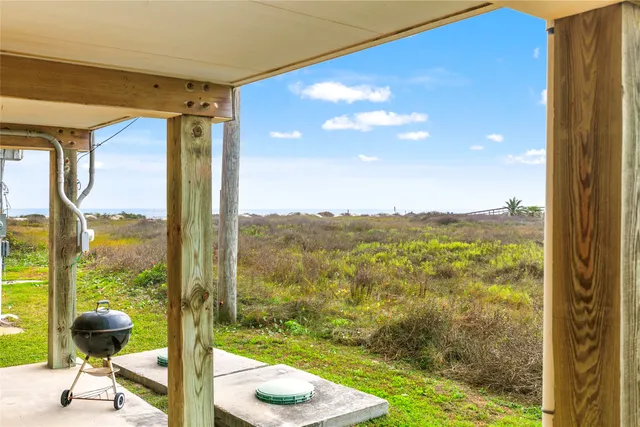 a view of a room with a large window