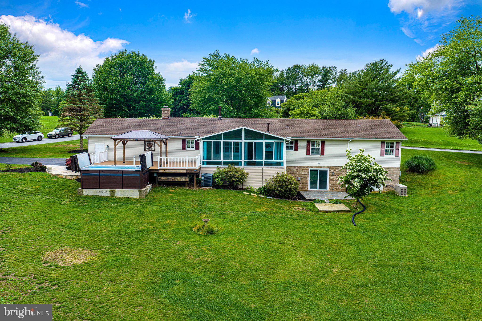 14300 Carroll Ridge Court Baldwin, MD 21013 - Photo 42 of 73 a aerial view of a house with a yard table and chairs