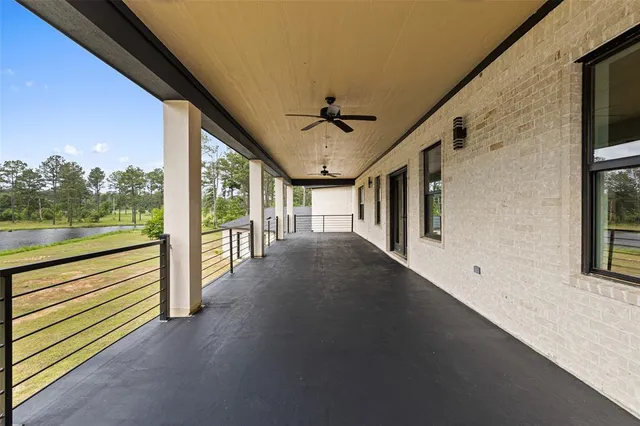 a view of a room with a large window