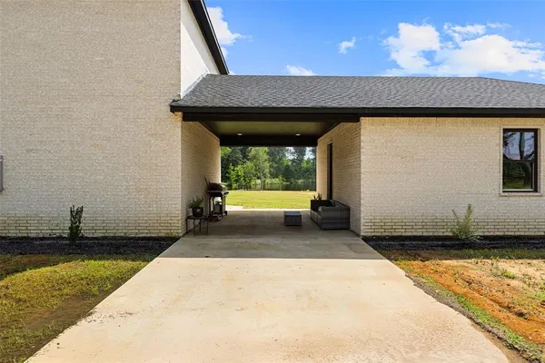 a view of a room with a large window