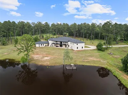 a view of a lake with a big yard