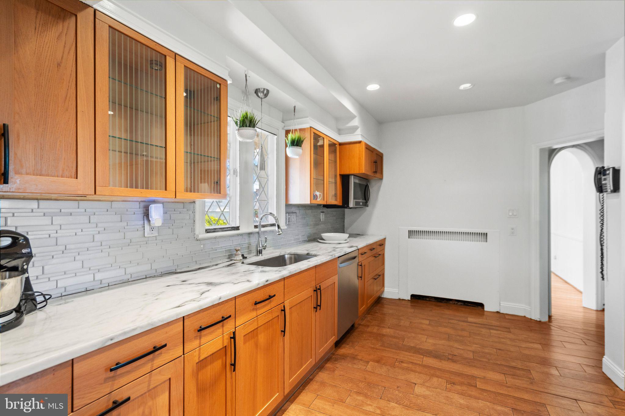 2116 Branch Avenue Southeast Washington, DC 20020 - Photo 15 of 32 a large kitchen with stainless steel appliances granite countertop a sink and a cabinets