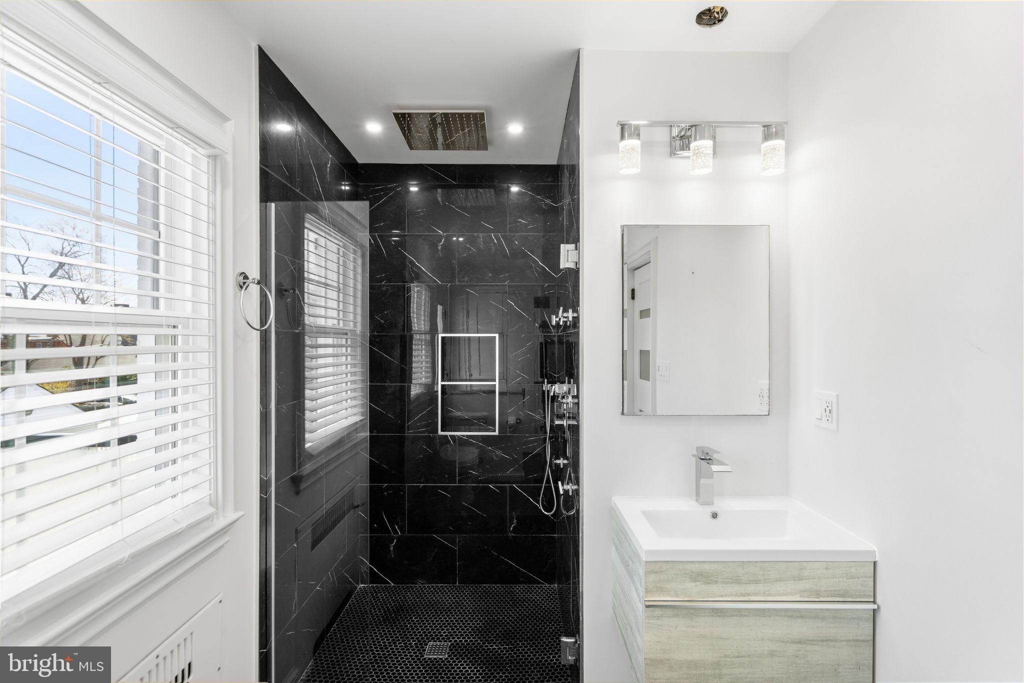 2116 Branch Avenue Southeast Washington, DC 20020 - Photo 20 of 32 a bathroom with a shower