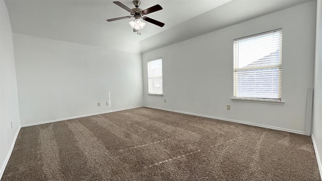 101 Rocky Pine Road McKinney, TX 75072 - Photo 14 of 31 a view of an empty room with a window