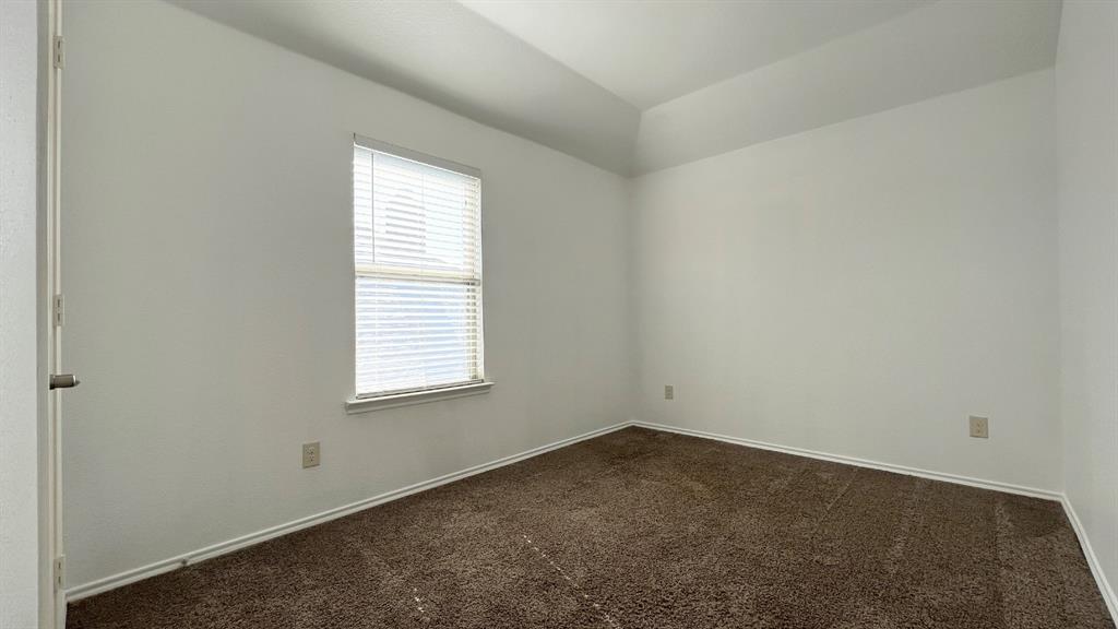 101 Rocky Pine Road McKinney, TX 75072 - Photo 16 of 31 an empty room with a window