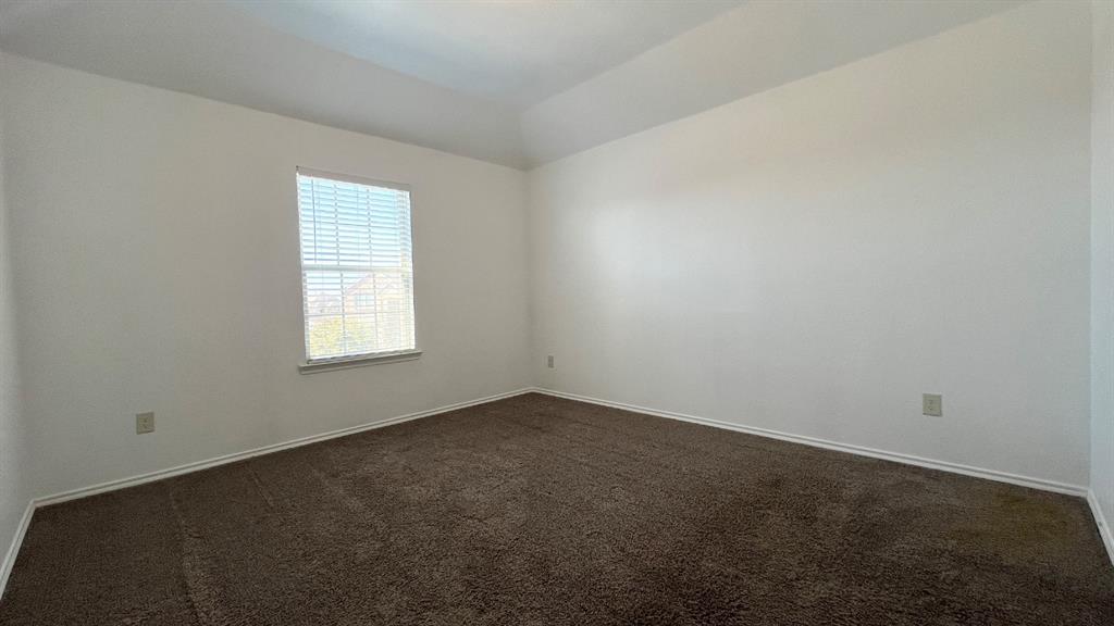 101 Rocky Pine Road McKinney, TX 75072 - Photo 18 of 31 an empty room with a window