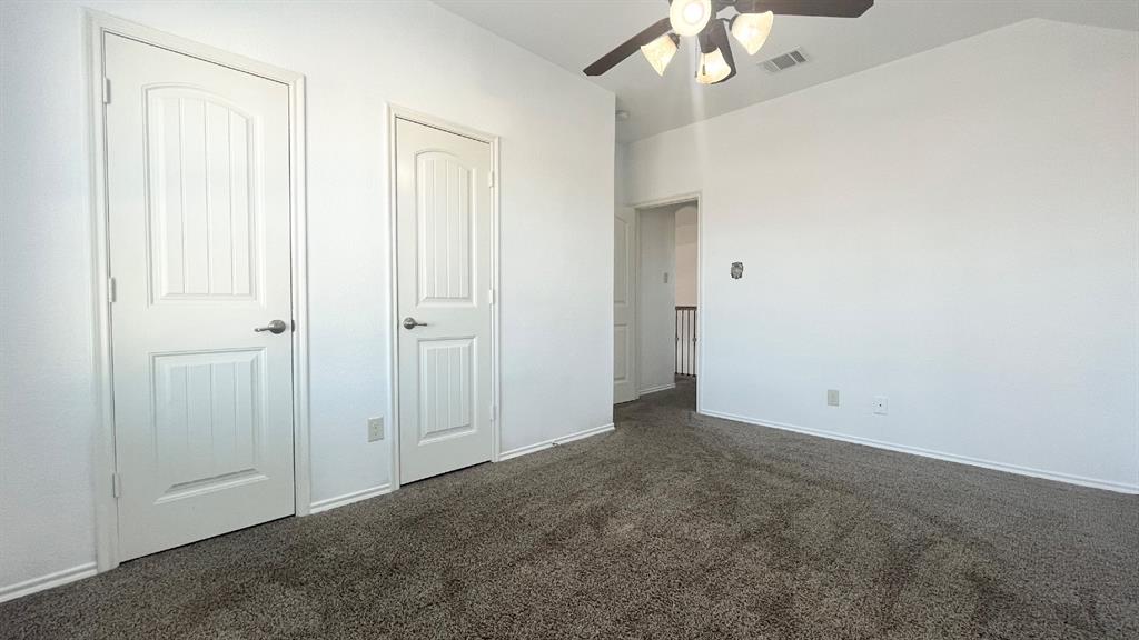 101 Rocky Pine Road McKinney, TX 75072 - Photo 19 of 31 an empty room with chandelier fan