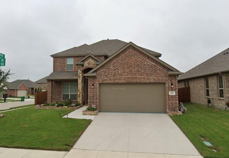 101 Rocky Pine Road McKinney, TX 75072 - Photo 2 of 31 a front view of house with yard