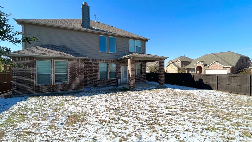 101 Rocky Pine Road McKinney, TX 75072 - Photo 26 of 31 a front view of a house with a yard