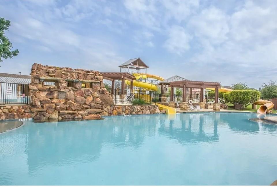 101 Rocky Pine Road McKinney, TX 75072 - Photo 28 of 31 a view of swimming pool with outdoor seating and lake view