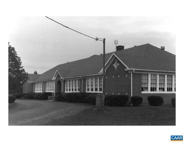a house view with a backyard space