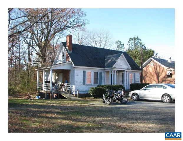 a view of outdoor space with deck and yard
