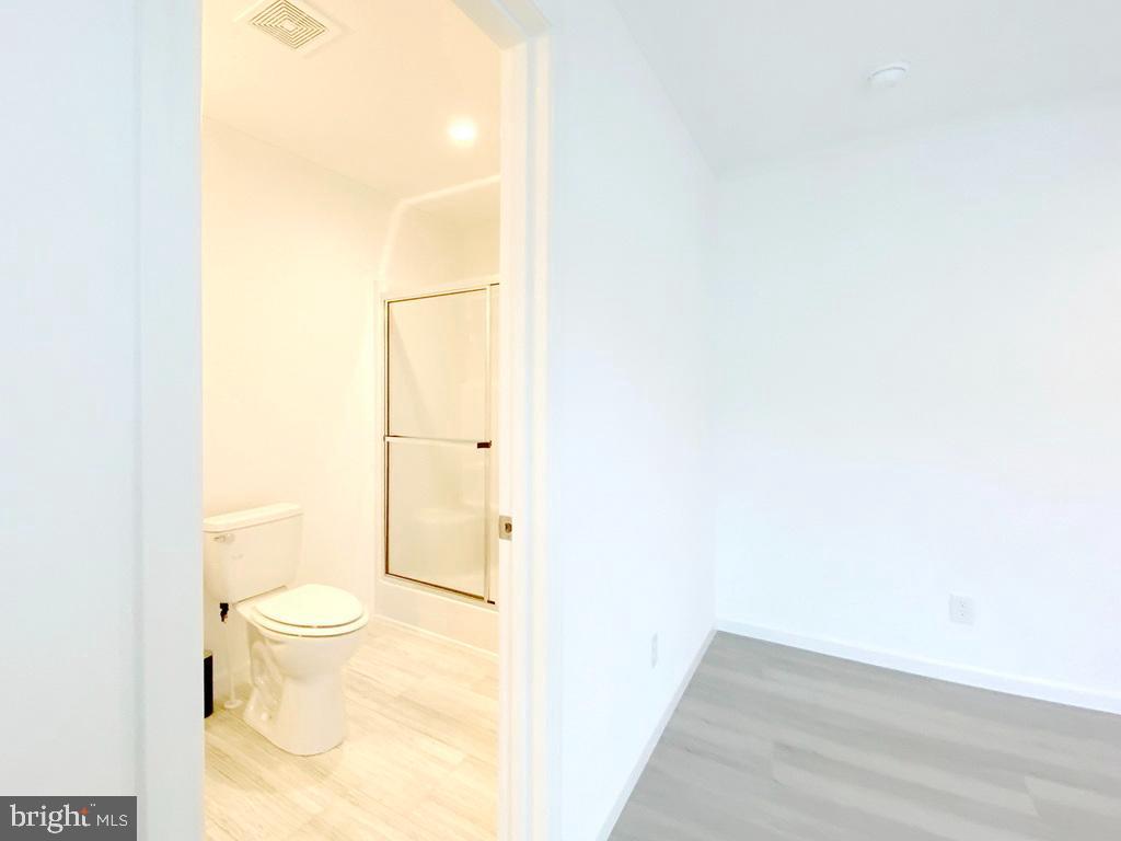 11 Folkstone Lane Lewes, DE 19958 - Photo 31 of 47 a bathroom with a toilet and a shower