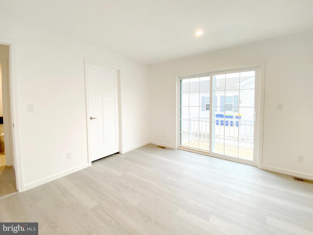 11 Folkstone Lane Lewes, DE 19958 - Photo 36 of 47 an empty room with windows