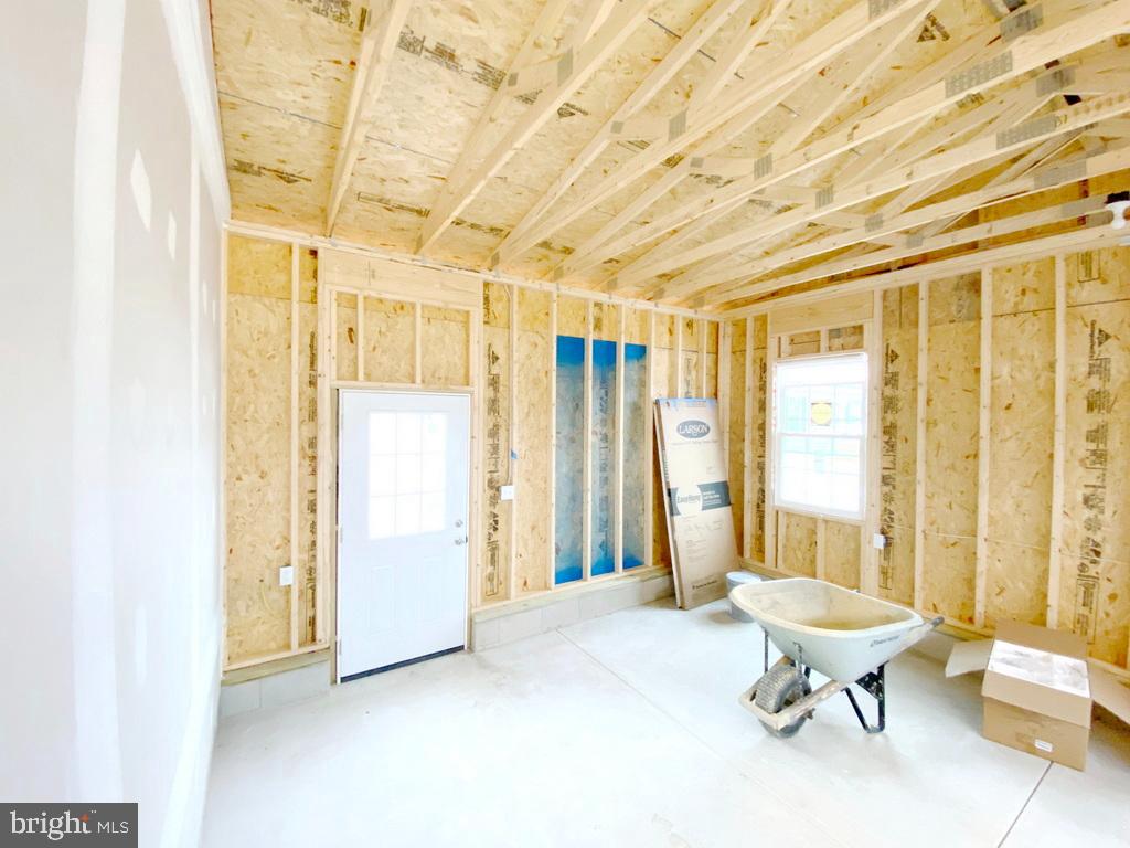 11 Folkstone Lane Lewes, DE 19958 - Photo 46 of 47 a living room with a furniture and a large window