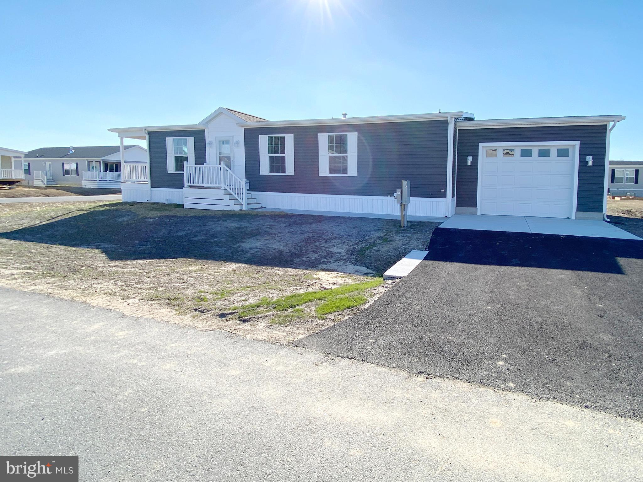 11 Folkstone Lane Lewes, DE 19958 - Photo 7 of 47 a front view of a house