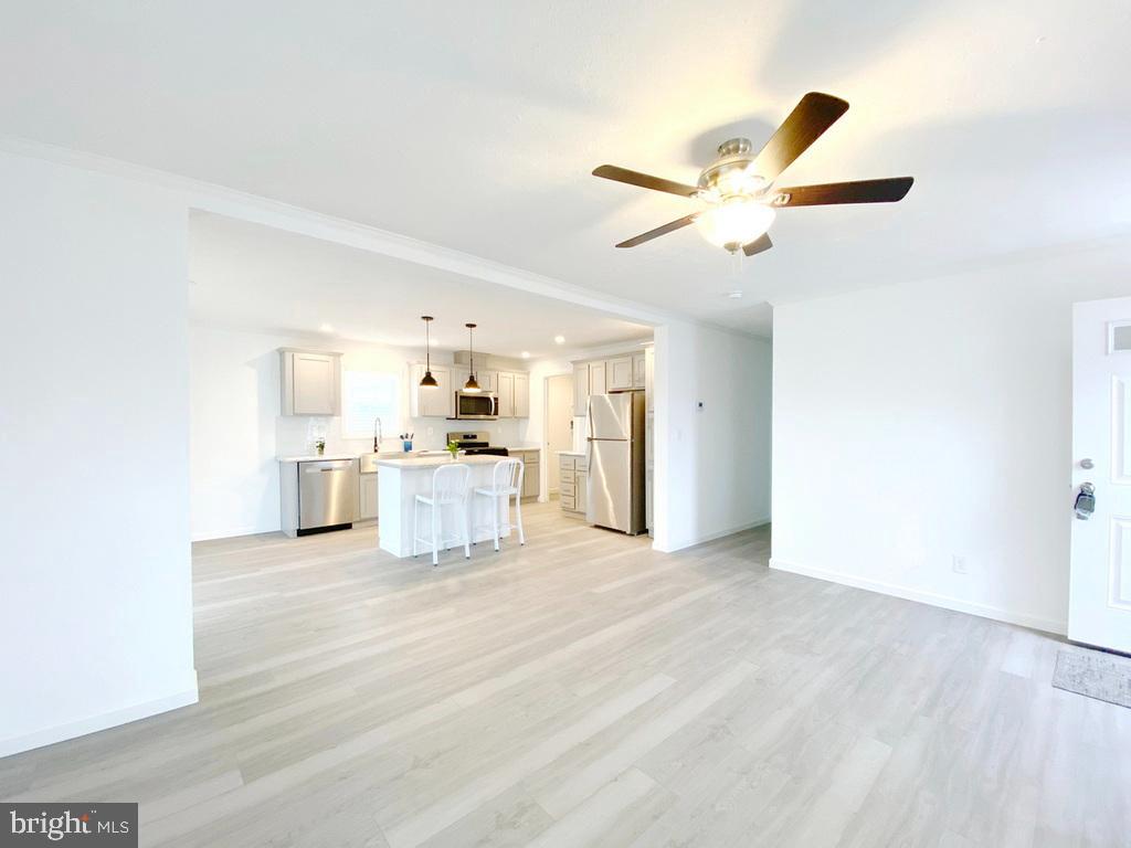11 Folkstone Lane Lewes, DE 19958 - Photo 9 of 47 a view of a kitchen with a sink and a window