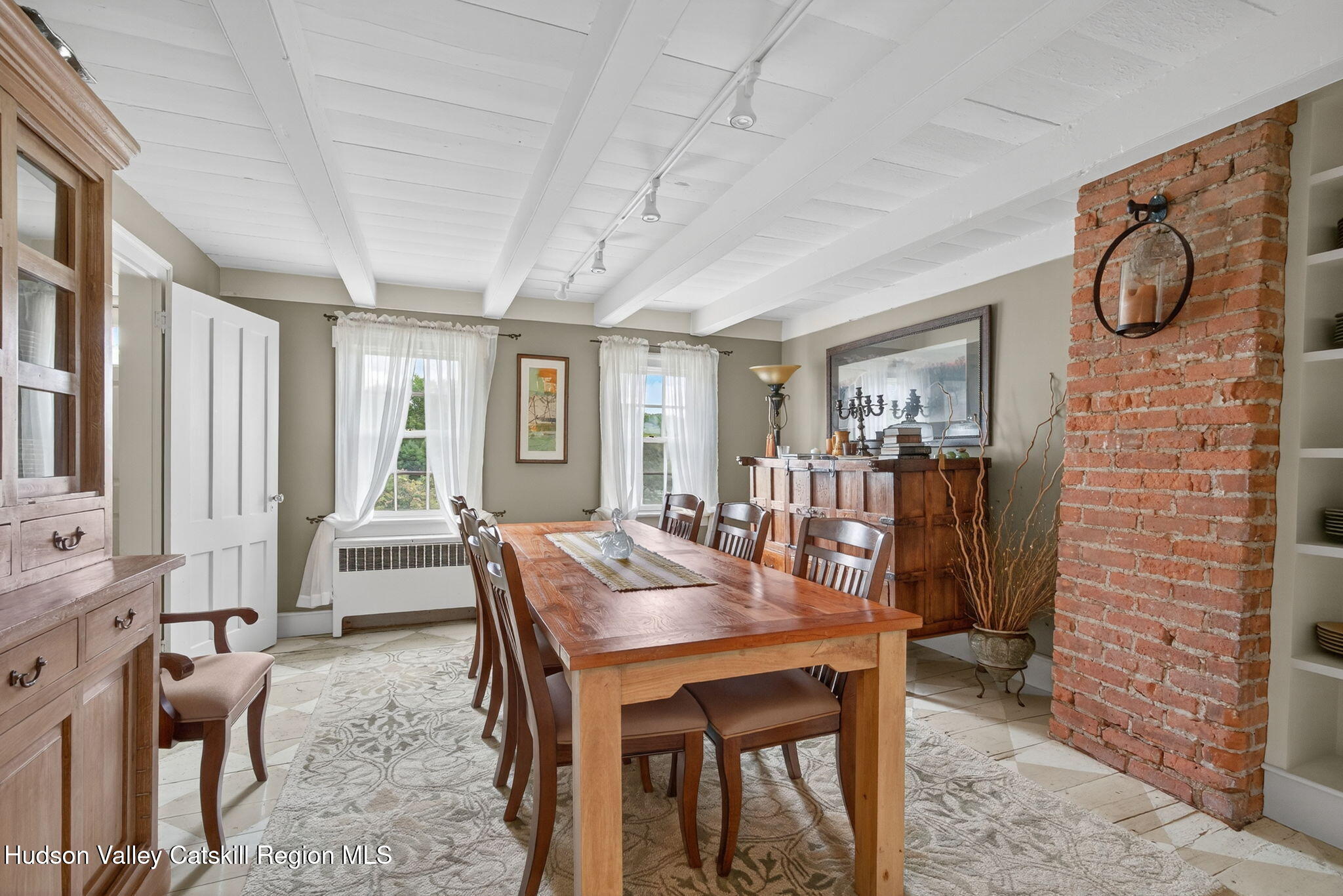 197-199 Chestnut Hill Road Stone Ridge, NY 12484 - Photo 35 of 63 a view of a dining room with furniture window and wooden floor