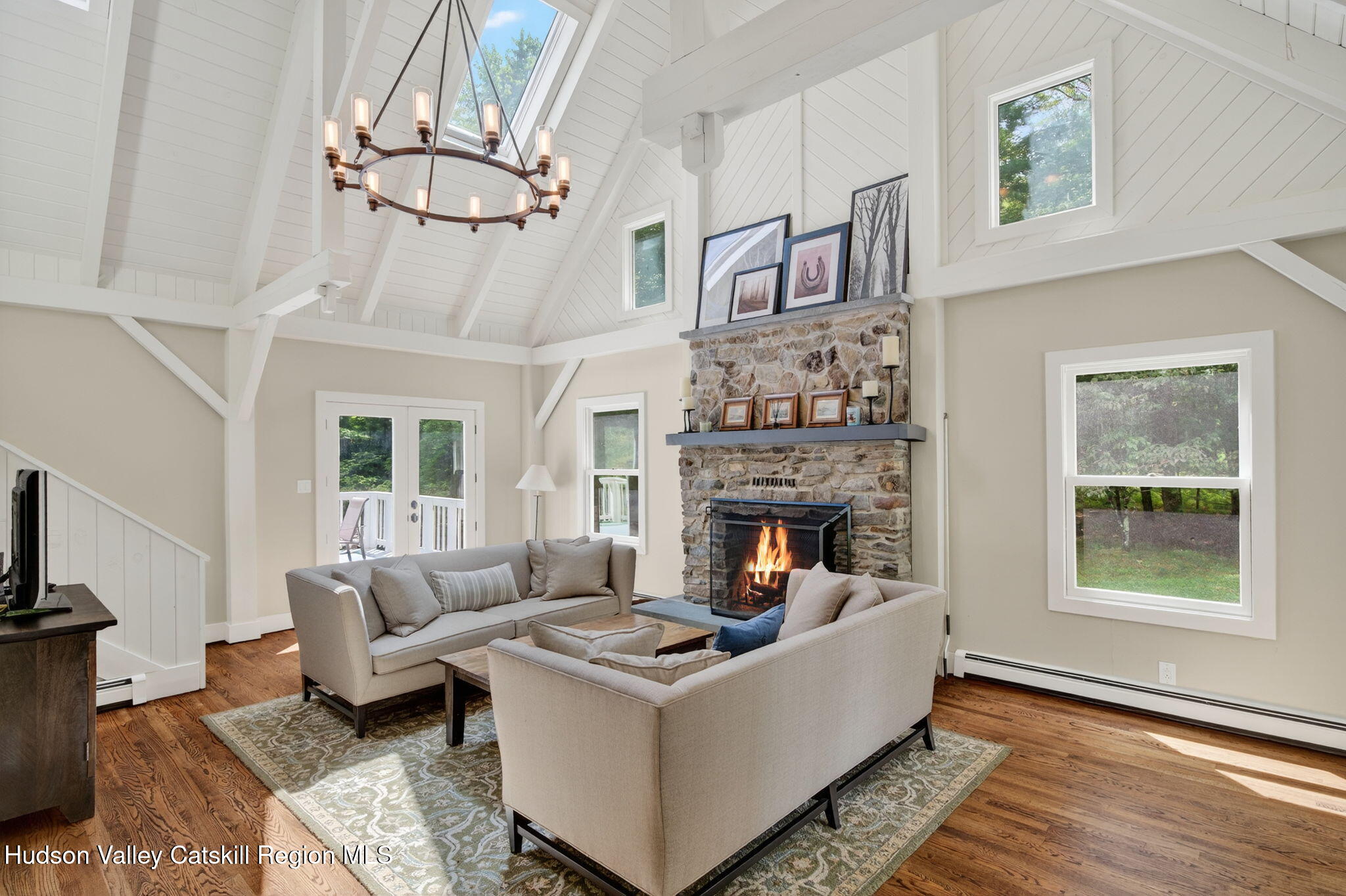 197-199 Chestnut Hill Road Stone Ridge, NY 12484 - Photo 40 of 63 a living room with furniture and a fireplace