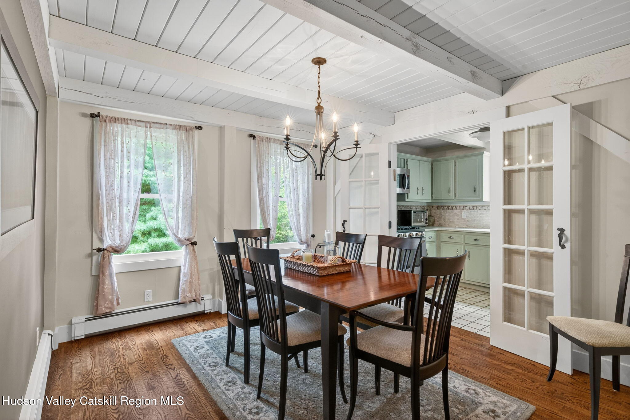 197-199 Chestnut Hill Road Stone Ridge, NY 12484 - Photo 42 of 63 a dining room with furniture window wooden floor