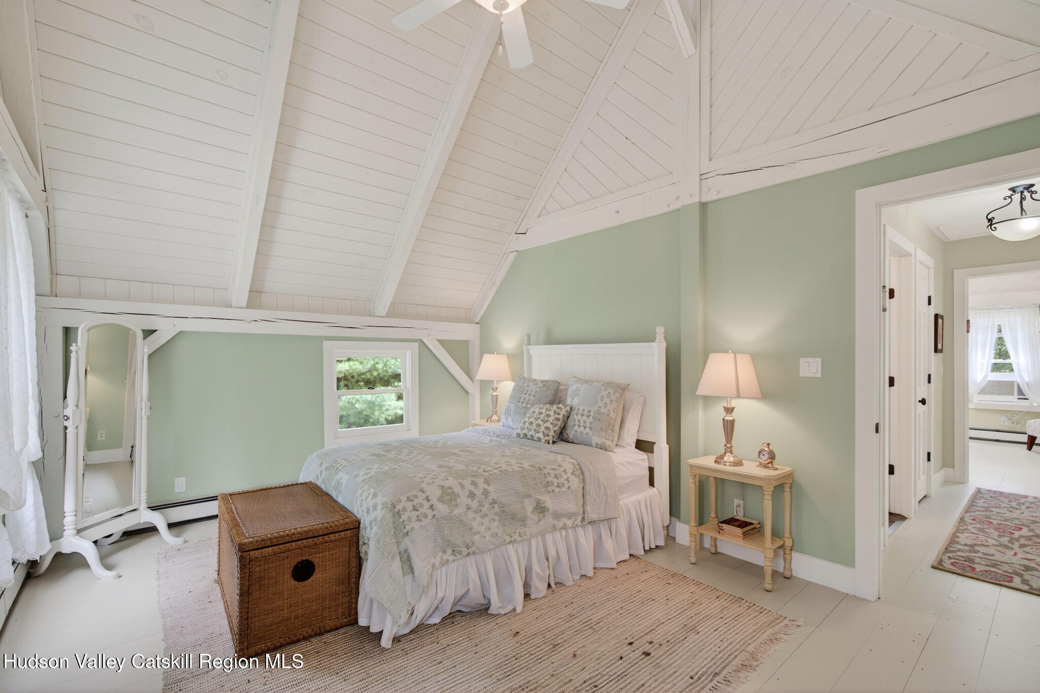 197-199 Chestnut Hill Road Stone Ridge, NY 12484 - Photo 47 of 63 a bedroom with a bed and a mirror