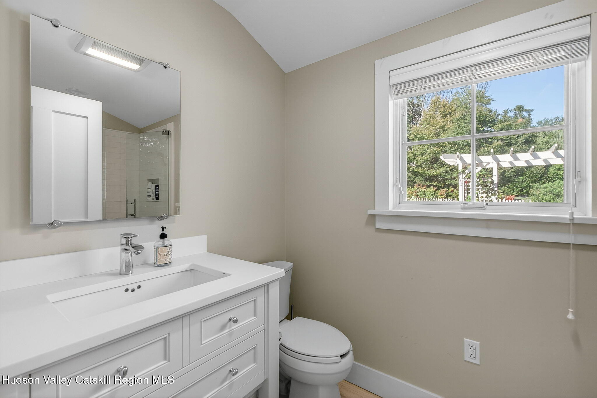 197-199 Chestnut Hill Road Stone Ridge, NY 12484 - Photo 56 of 63 a bathroom with a sink toilet and a mirror