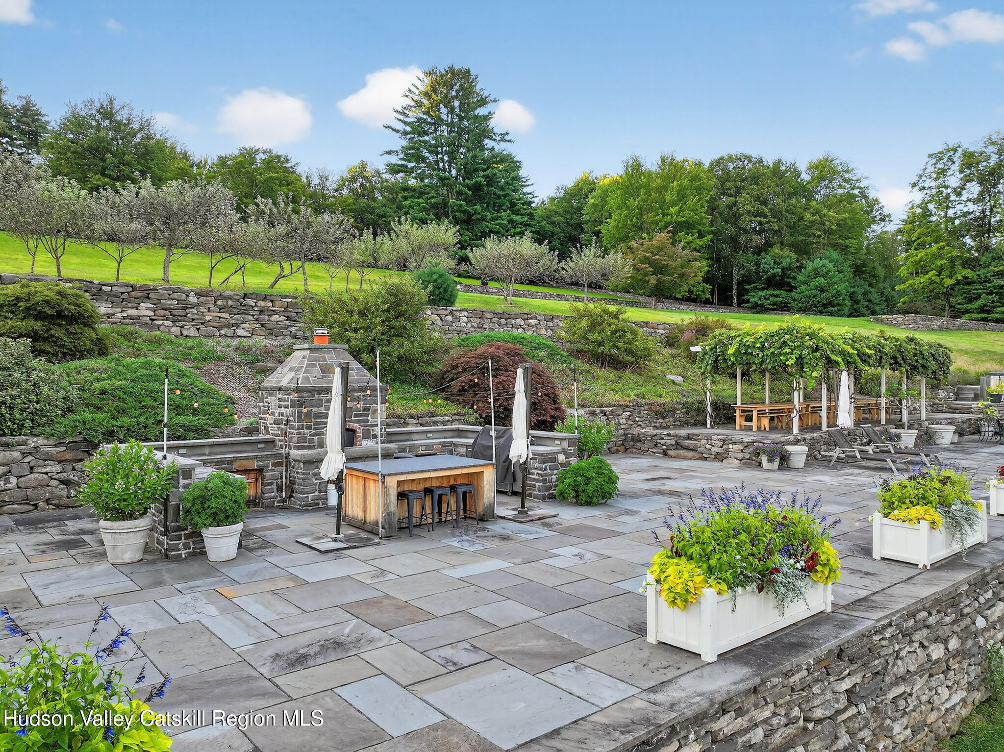 197-199 Chestnut Hill Road Stone Ridge, NY 12484 - Photo 6 of 63 a view of a swimming pool with a patio and a garden