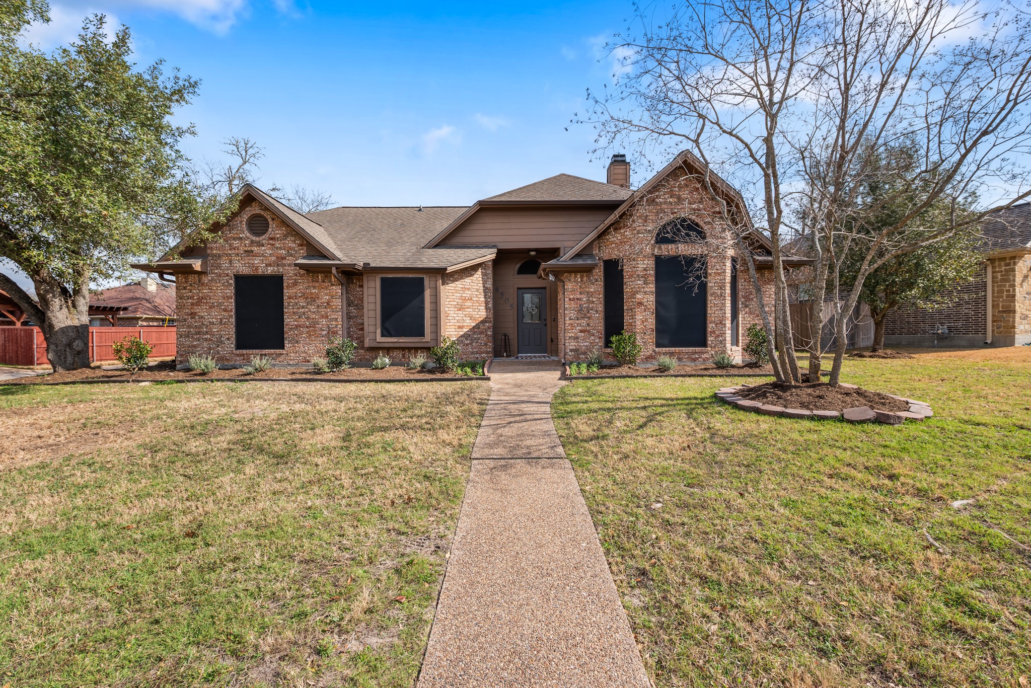 4505 Kensington Road Bryan, TX 77802 - Photo 5 of 26 Welcome home to 4505 Kensington - located on a large corner lot with mature trees