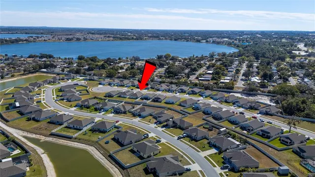 an aerial view of a city with lots of residential buildings