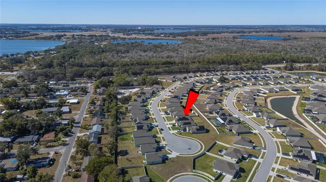 a view of a lake with a house