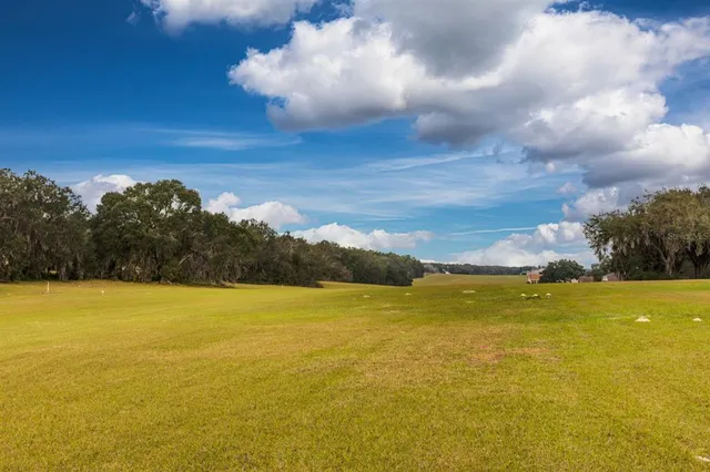 a view of an ocean and a mountain
