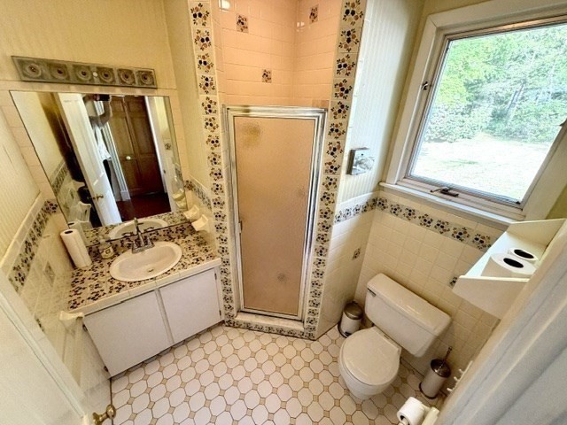 60 Massasoit Street Northampton, MA 01060 - Photo 9 of 19 a bathroom with a sink toilet and shower