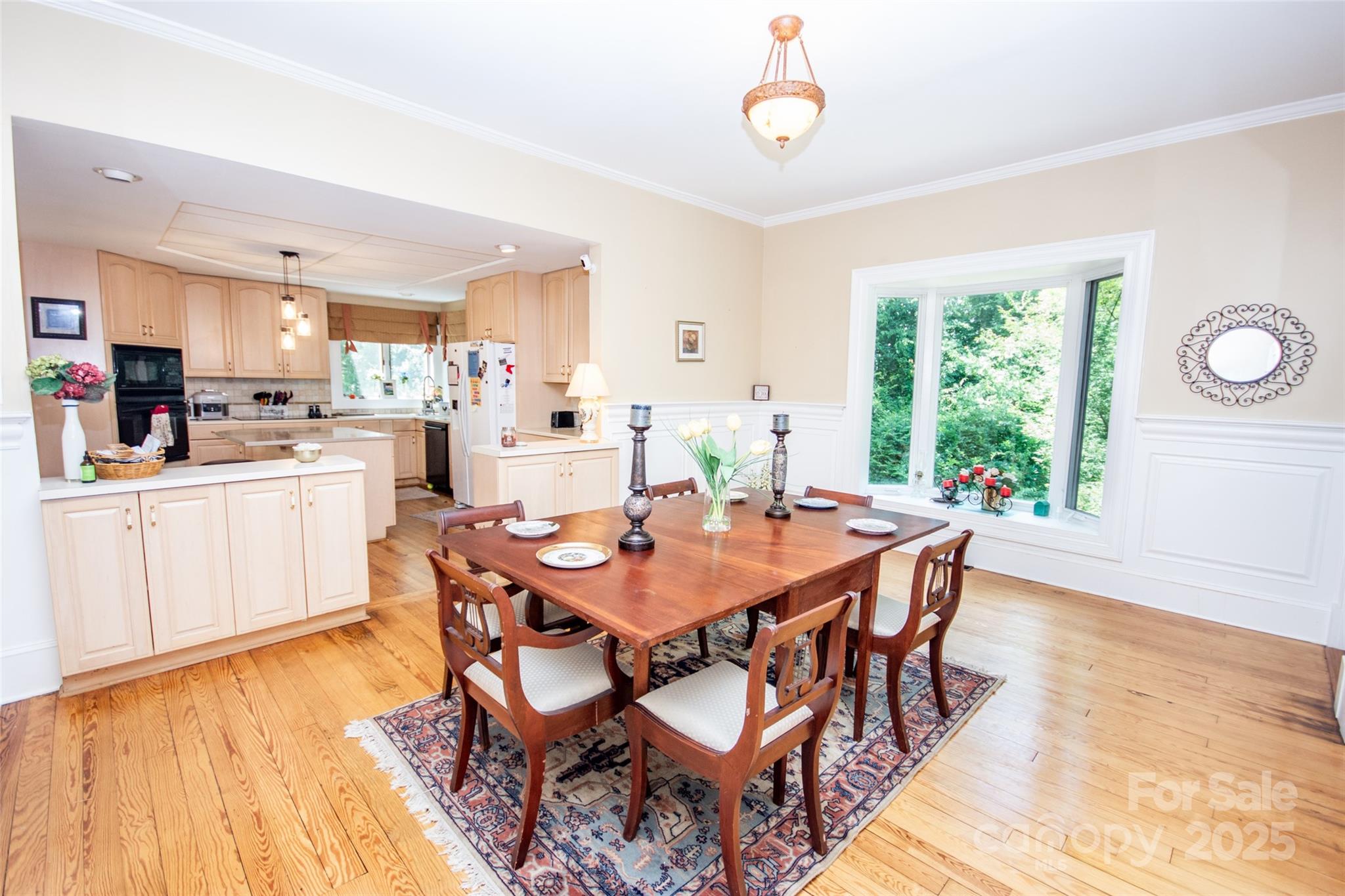 10245 Cool Springs Road Cleveland, NC 27013 - Photo 15 of 48 a view of a dining room with furniture window and wooden floor