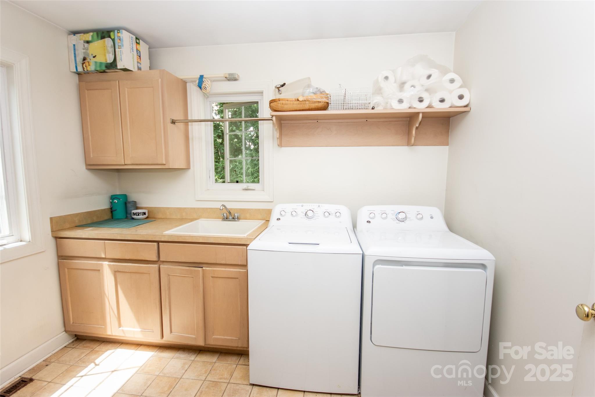 10245 Cool Springs Road Cleveland, NC 27013 - Photo 19 of 48 a utility room with dryer and washer