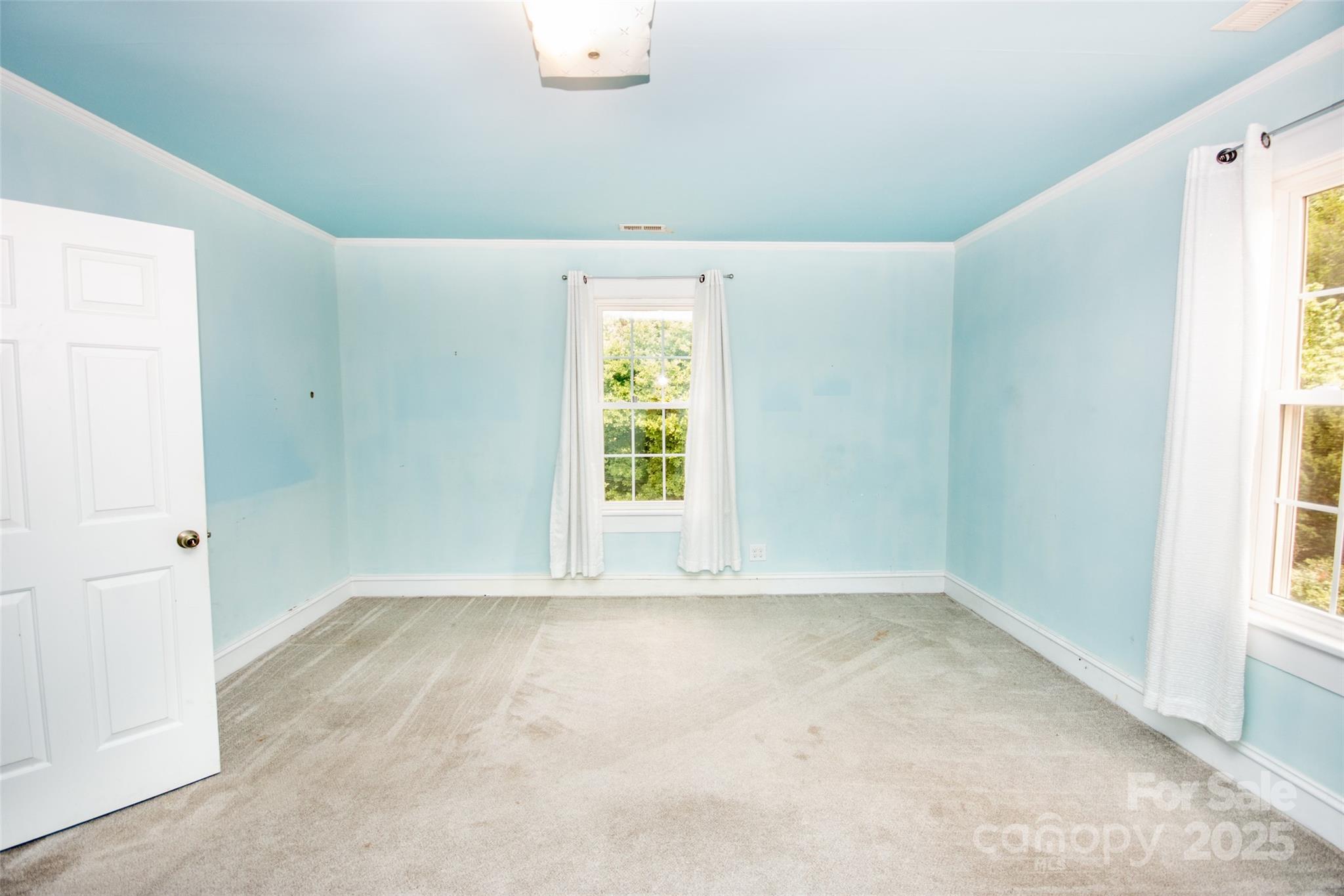 10245 Cool Springs Road Cleveland, NC 27013 - Photo 20 of 48 a view of an empty room with a window