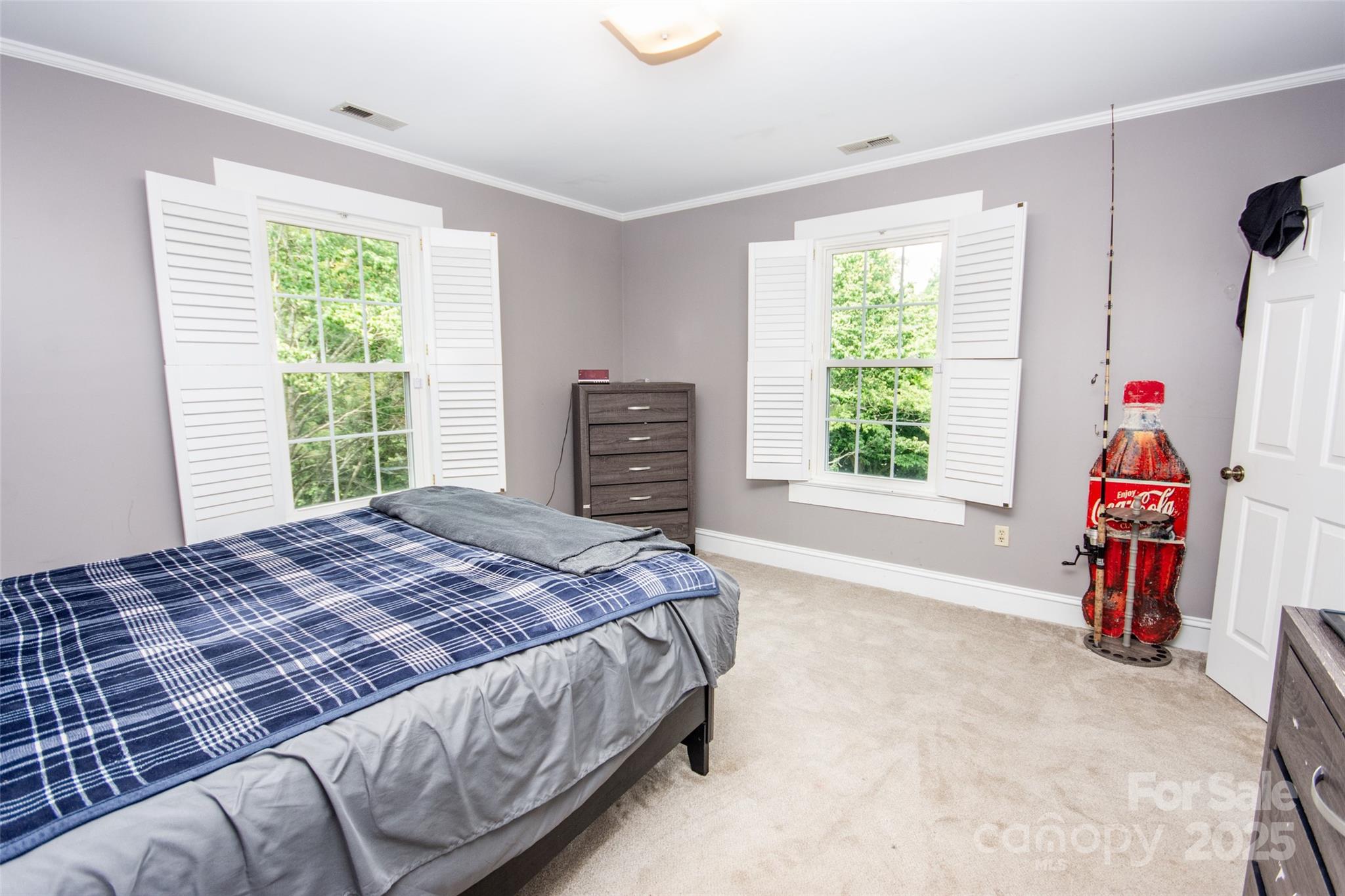 10245 Cool Springs Road Cleveland, NC 27013 - Photo 22 of 48 a bedroom with a bed and a window