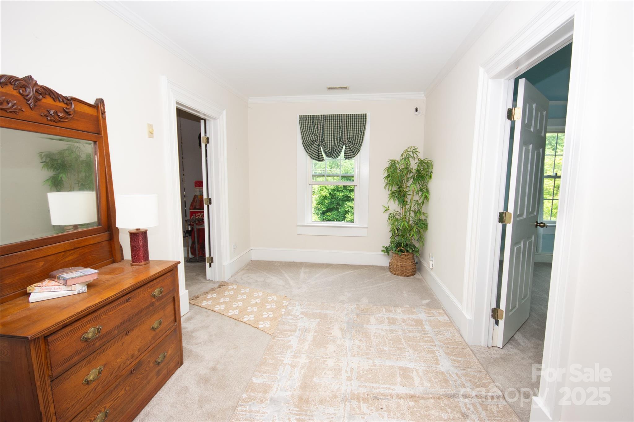 10245 Cool Springs Road Cleveland, NC 27013 - Photo 23 of 48 a view of a hallway with bathroom and mirror