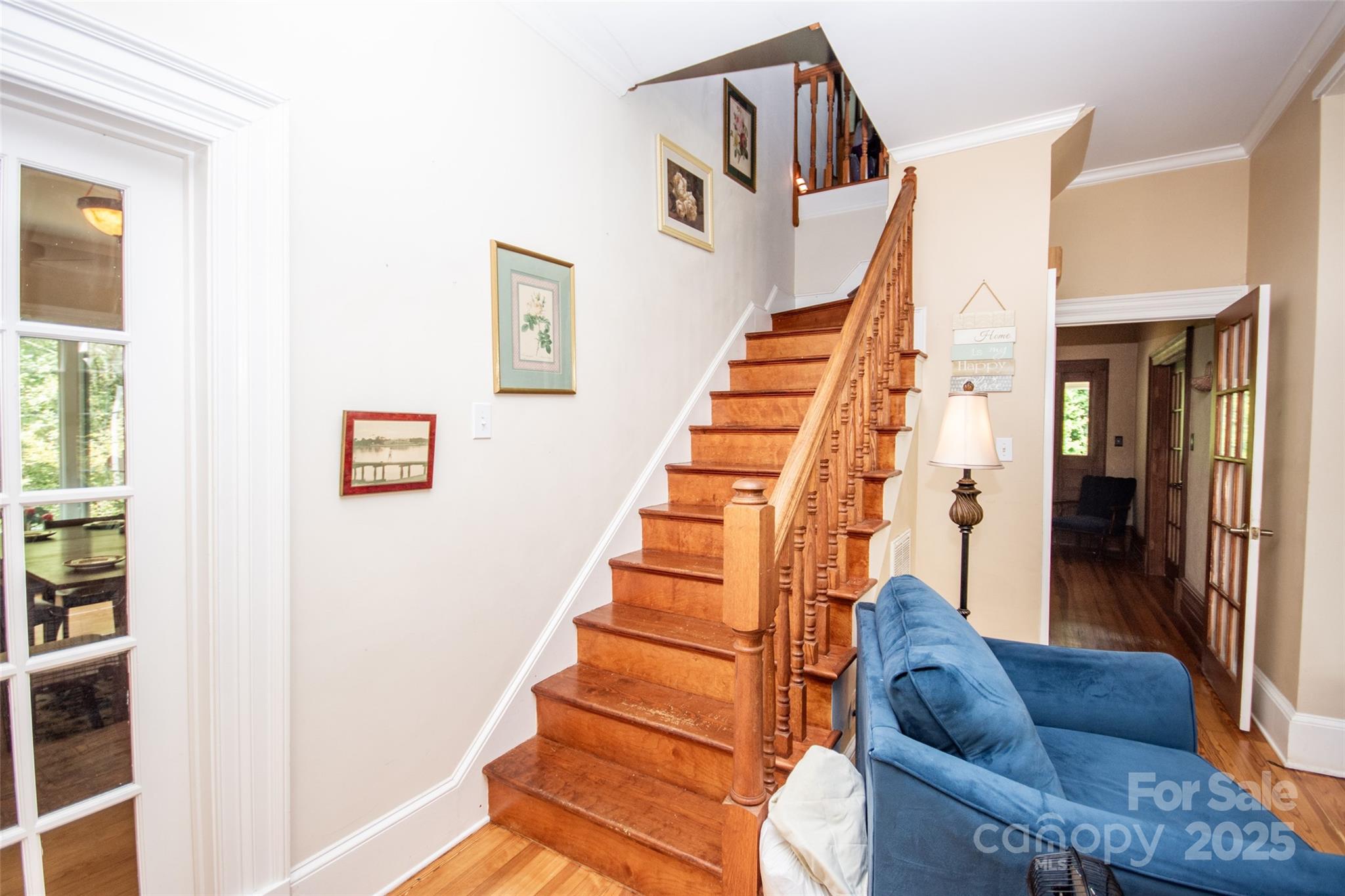 10245 Cool Springs Road Cleveland, NC 27013 - Photo 30 of 48 a living room with furniture and stairs