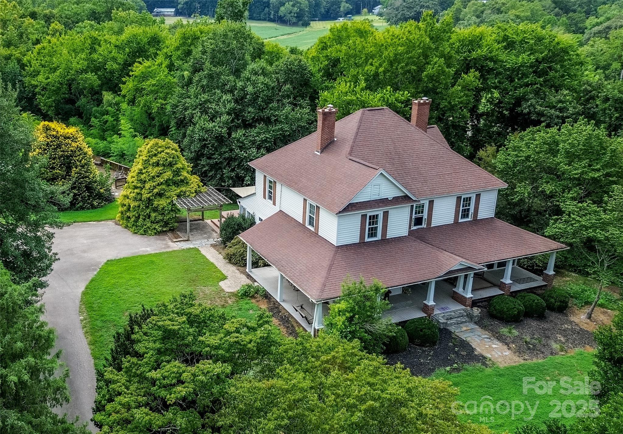 10245 Cool Springs Road Cleveland, NC 27013 - Photo 44 of 48 a aerial view of a house